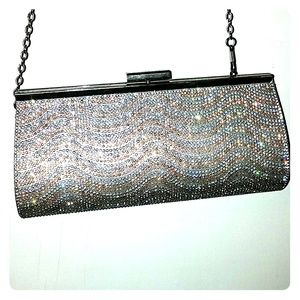 Silver and gold gem clutch